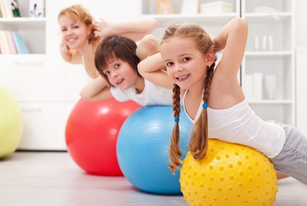 children on exercise balls